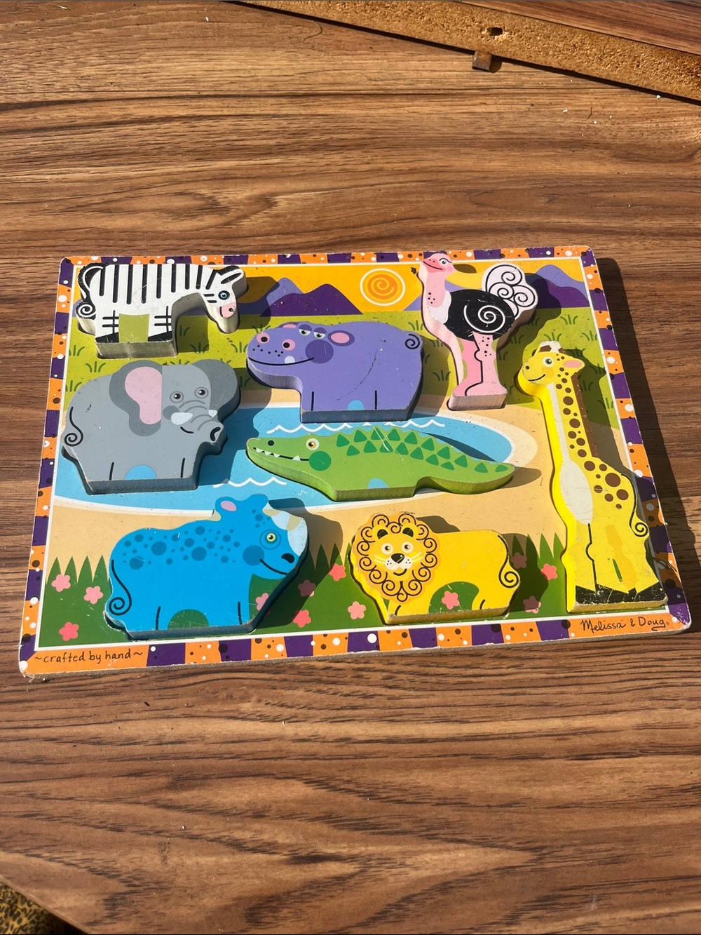 Melissa & Doug Colorful Safari Animal Peg Puzzle - Multicolor